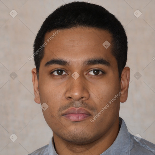 Neutral latino young-adult male with short  black hair and brown eyes