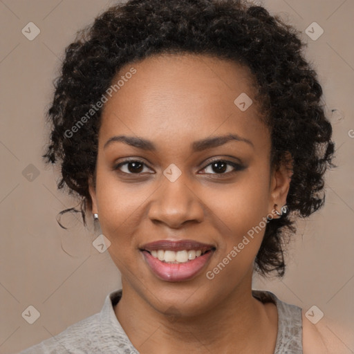 Joyful black young-adult female with medium  black hair and brown eyes