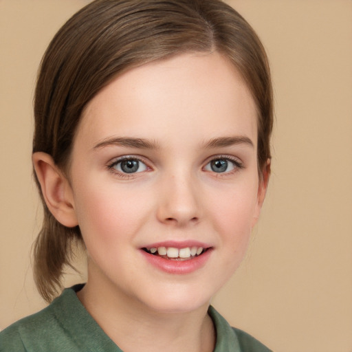 Joyful white child female with long  brown hair and brown eyes