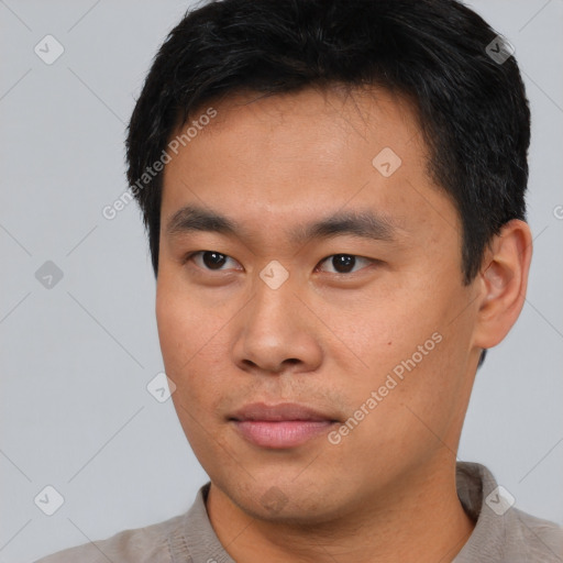 Neutral asian young-adult male with short  black hair and brown eyes