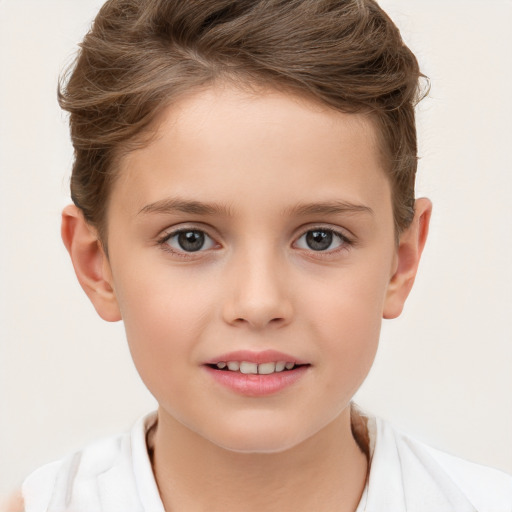 Joyful white child female with short  brown hair and brown eyes