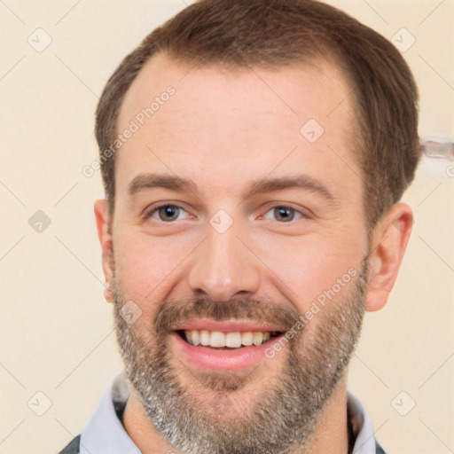 Joyful white young-adult male with short  brown hair and brown eyes