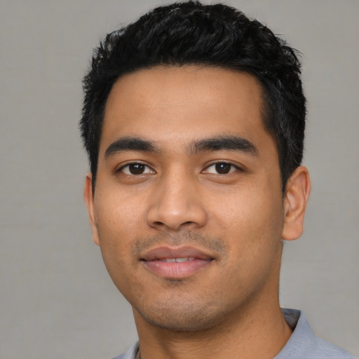 Neutral latino young-adult male with short  black hair and brown eyes