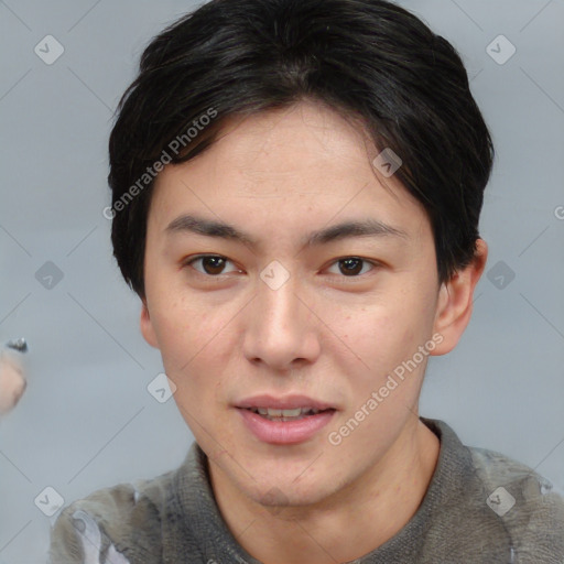 Joyful asian young-adult male with short  brown hair and brown eyes