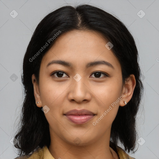 Joyful latino young-adult female with medium  brown hair and brown eyes