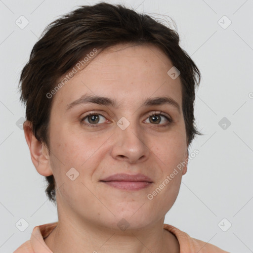 Joyful white young-adult female with short  brown hair and brown eyes