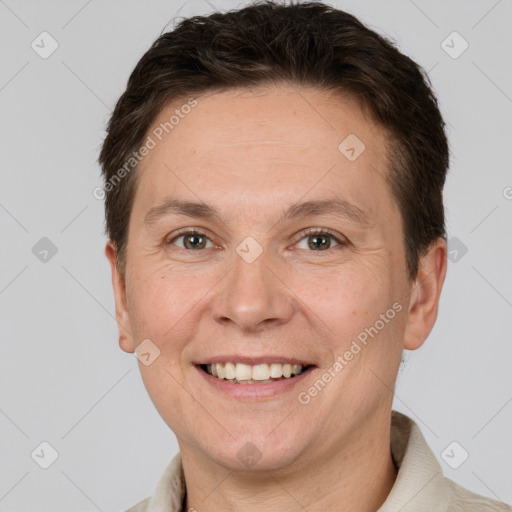 Joyful white adult male with short  brown hair and grey eyes