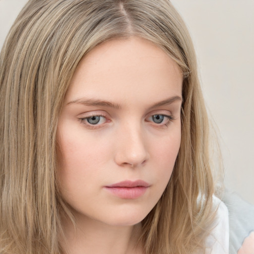 Neutral white young-adult female with long  brown hair and blue eyes