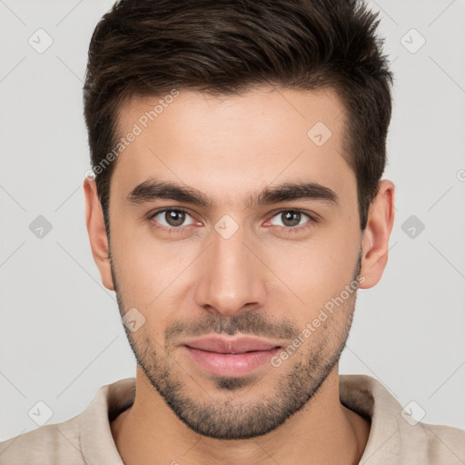 Neutral white young-adult male with short  brown hair and brown eyes