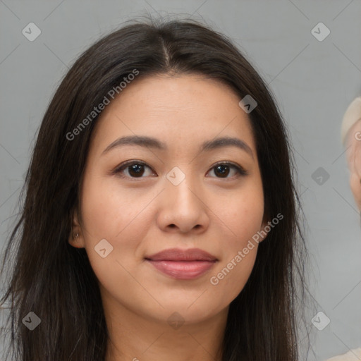 Joyful asian young-adult female with long  brown hair and brown eyes