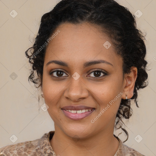 Joyful black young-adult female with medium  brown hair and brown eyes