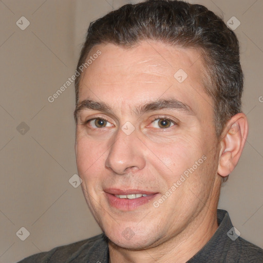 Joyful white adult male with short  brown hair and brown eyes