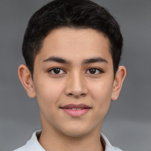 Joyful latino young-adult male with short  brown hair and brown eyes