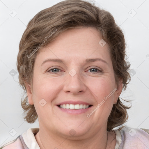 Joyful white young-adult female with medium  brown hair and blue eyes