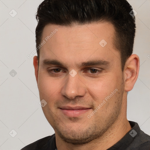 Joyful white young-adult male with short  brown hair and brown eyes