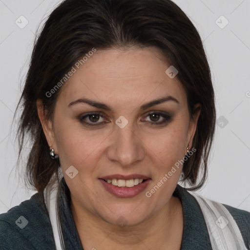 Joyful white adult female with medium  brown hair and brown eyes