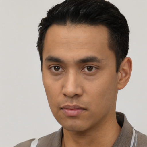 Neutral asian young-adult male with short  black hair and brown eyes