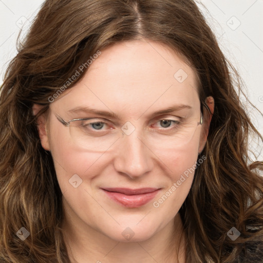 Joyful white young-adult female with long  brown hair and blue eyes