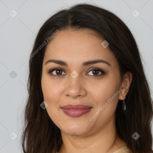 Joyful latino young-adult female with medium  brown hair and brown eyes