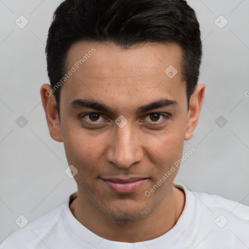 Joyful white young-adult male with short  black hair and brown eyes