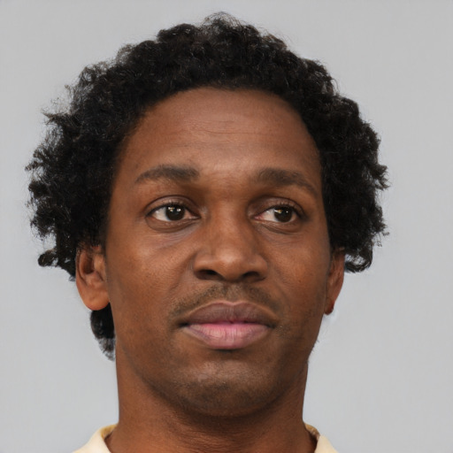 Neutral black young-adult male with short  brown hair and brown eyes