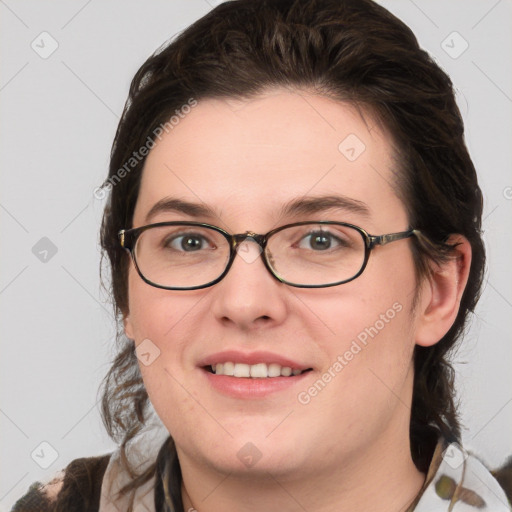 Joyful white young-adult female with medium  brown hair and green eyes