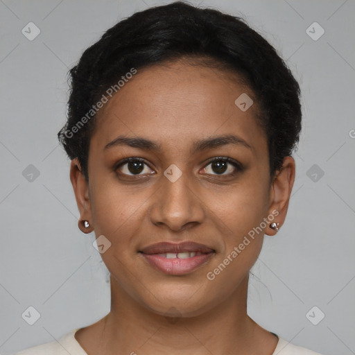 Joyful black young-adult female with short  brown hair and brown eyes