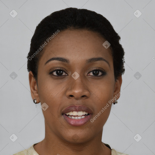 Joyful black young-adult female with short  black hair and brown eyes