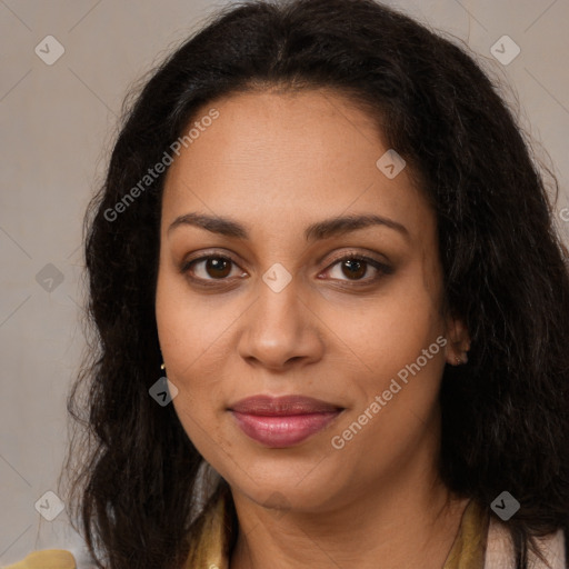 Joyful latino young-adult female with long  brown hair and brown eyes