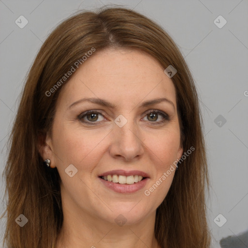 Joyful white adult female with long  brown hair and brown eyes