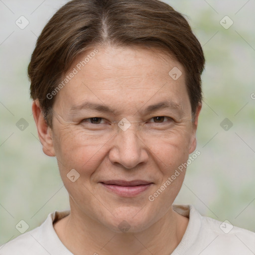 Joyful white adult female with short  brown hair and brown eyes