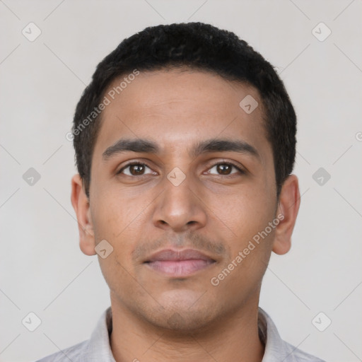 Neutral latino young-adult male with short  black hair and brown eyes