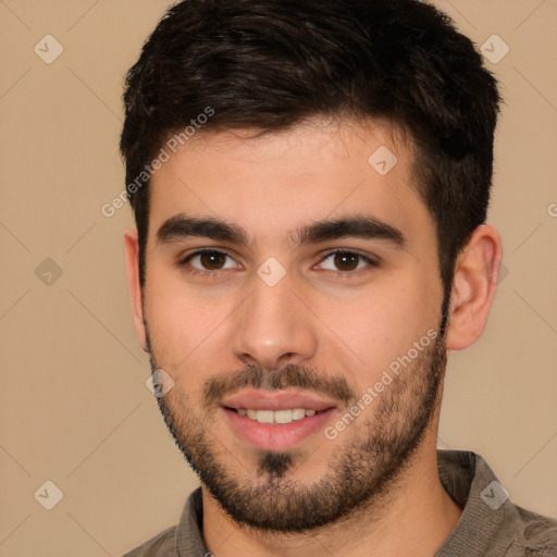 Joyful white young-adult male with short  brown hair and brown eyes