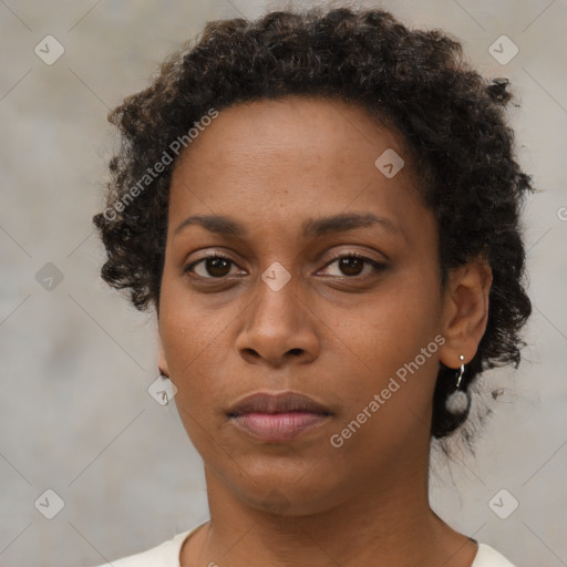 Neutral black young-adult female with short  brown hair and brown eyes