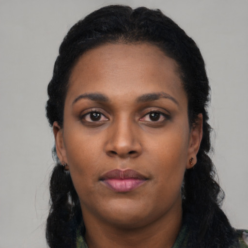 Neutral black young-adult female with long  black hair and brown eyes