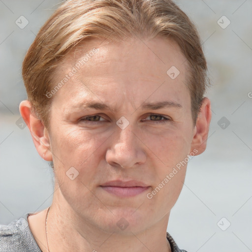 Joyful white adult male with short  brown hair and grey eyes