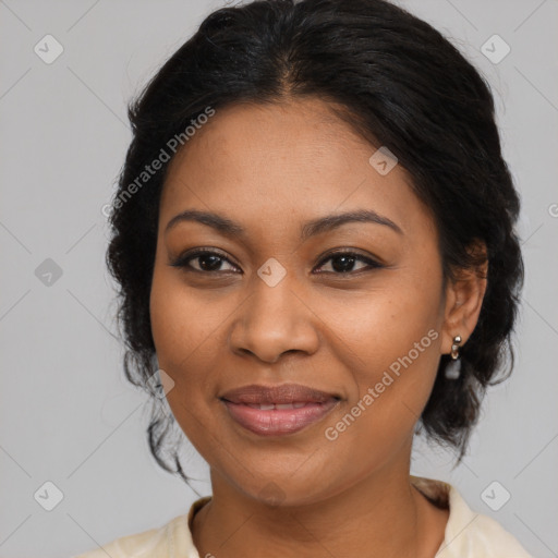 Joyful latino adult female with medium  brown hair and brown eyes