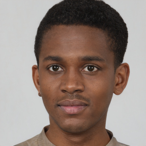 Neutral black young-adult male with short  brown hair and brown eyes