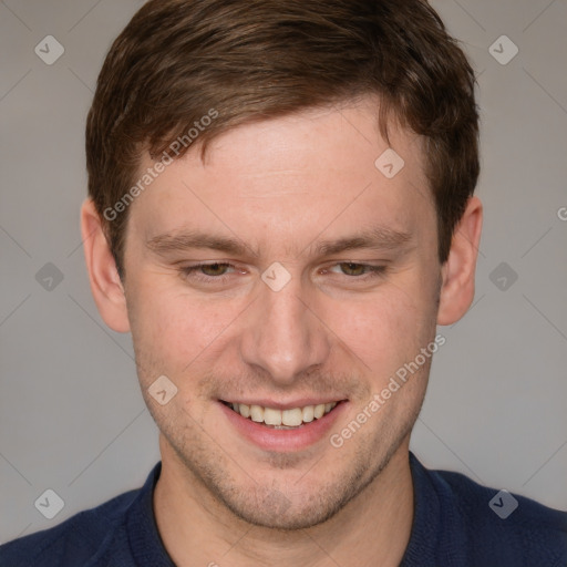 Joyful white adult male with short  brown hair and grey eyes