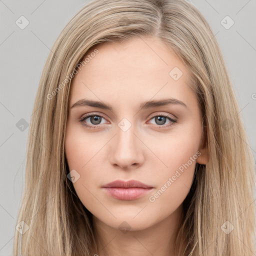 Neutral white young-adult female with long  brown hair and brown eyes