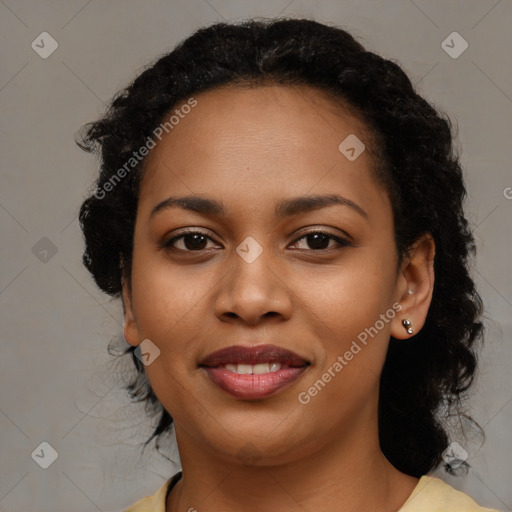 Joyful latino young-adult female with long  black hair and brown eyes