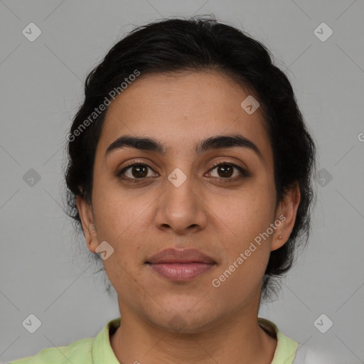 Joyful latino young-adult female with medium  brown hair and brown eyes