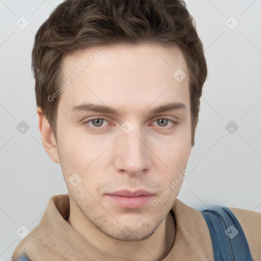 Neutral white young-adult male with short  brown hair and grey eyes