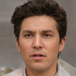 Neutral white adult male with short  brown hair and brown eyes