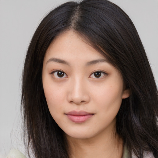 Neutral asian young-adult female with long  brown hair and brown eyes