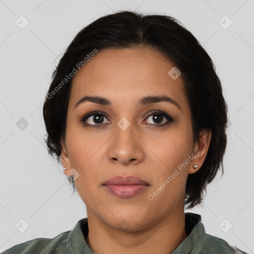 Joyful latino young-adult female with medium  brown hair and brown eyes