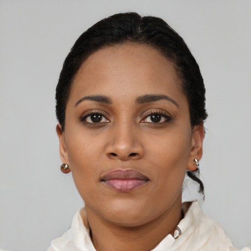 Neutral black young-adult female with short  black hair and brown eyes