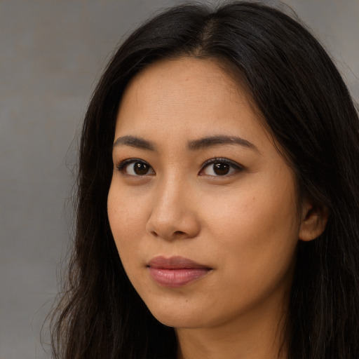 Neutral asian young-adult female with long  brown hair and brown eyes
