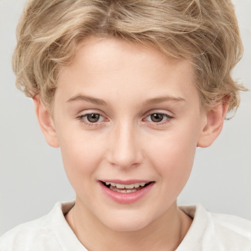 Joyful white child female with short  brown hair and brown eyes