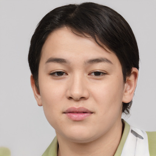 Joyful asian young-adult female with short  brown hair and brown eyes